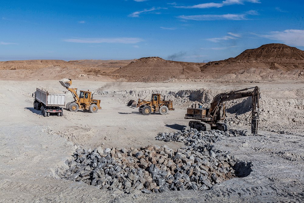 Excavators working at a mining site